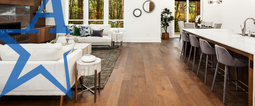 a living room with hardwood floors | All American Flooring