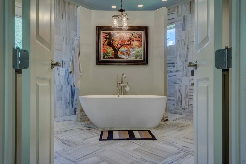 Bathroom tile flooring with bath tub | All American Flooring