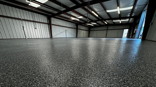 interior of a modern building Epoxy floor in warehouse | All American Flooring